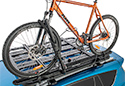 Image is representative of Rhino-Rack Hybrid Roof Mount Bike Rack.<br/>Due to variations in monitor settings and differences in vehicle models, your specific part number (RBC050) may vary.